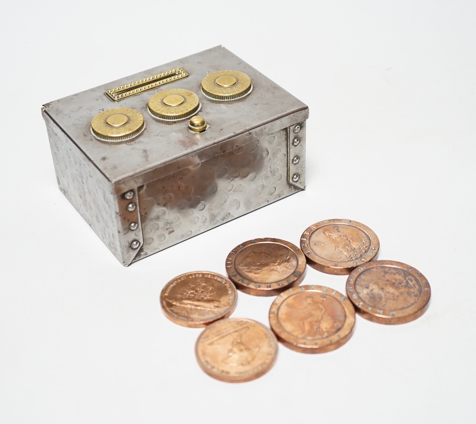 A metal and brass money box (locked) and contents together with 1797 twopence copper coins, polished